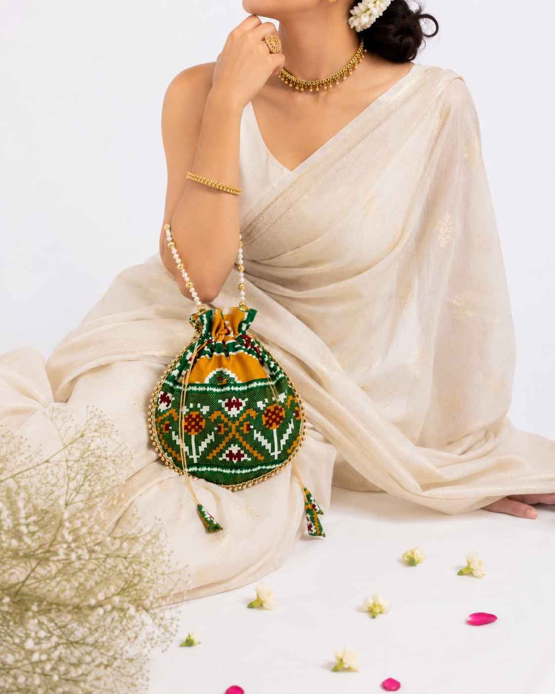 Premium Traditional Ikat Patola Potli Bag – Gold Bead Trim & Beaded Strap