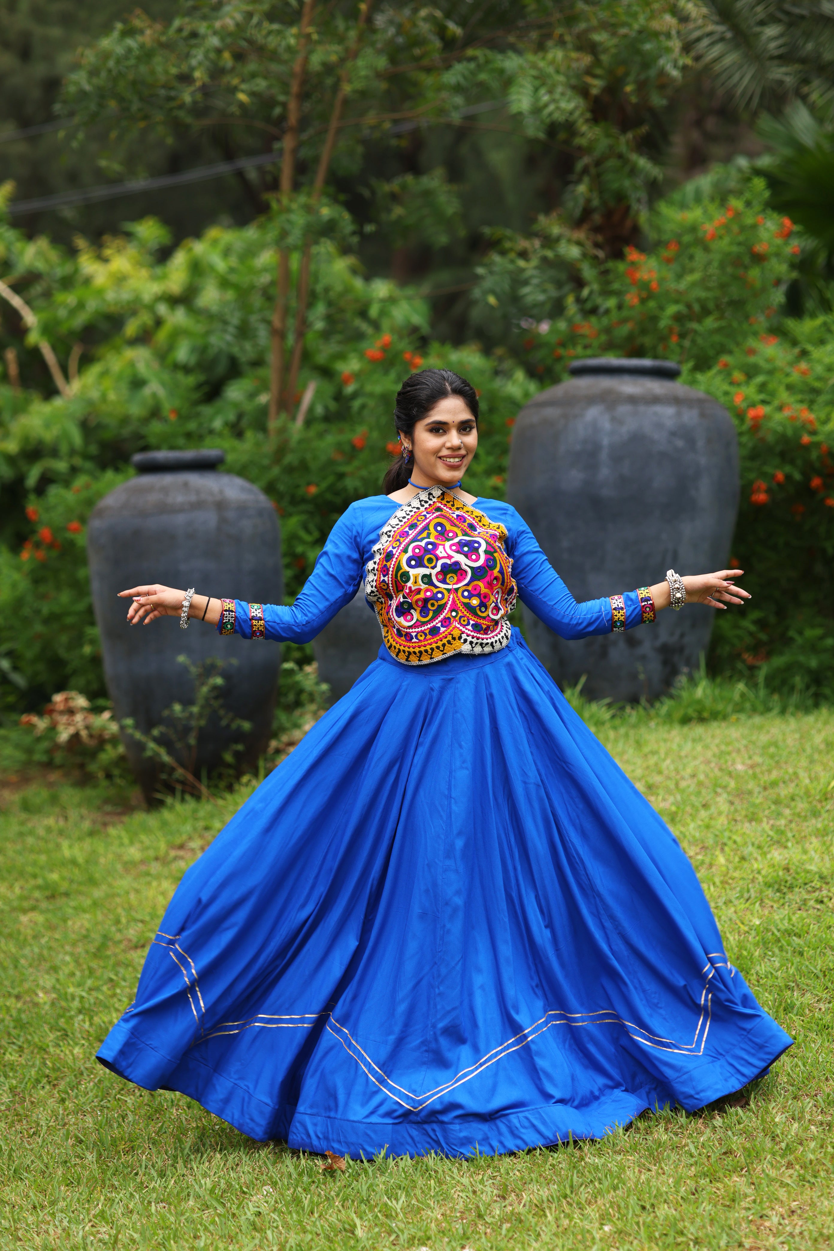 Royal Blue Navratri Lehenga Choli with Halter-Neck Kutchi Embroidered Bodice