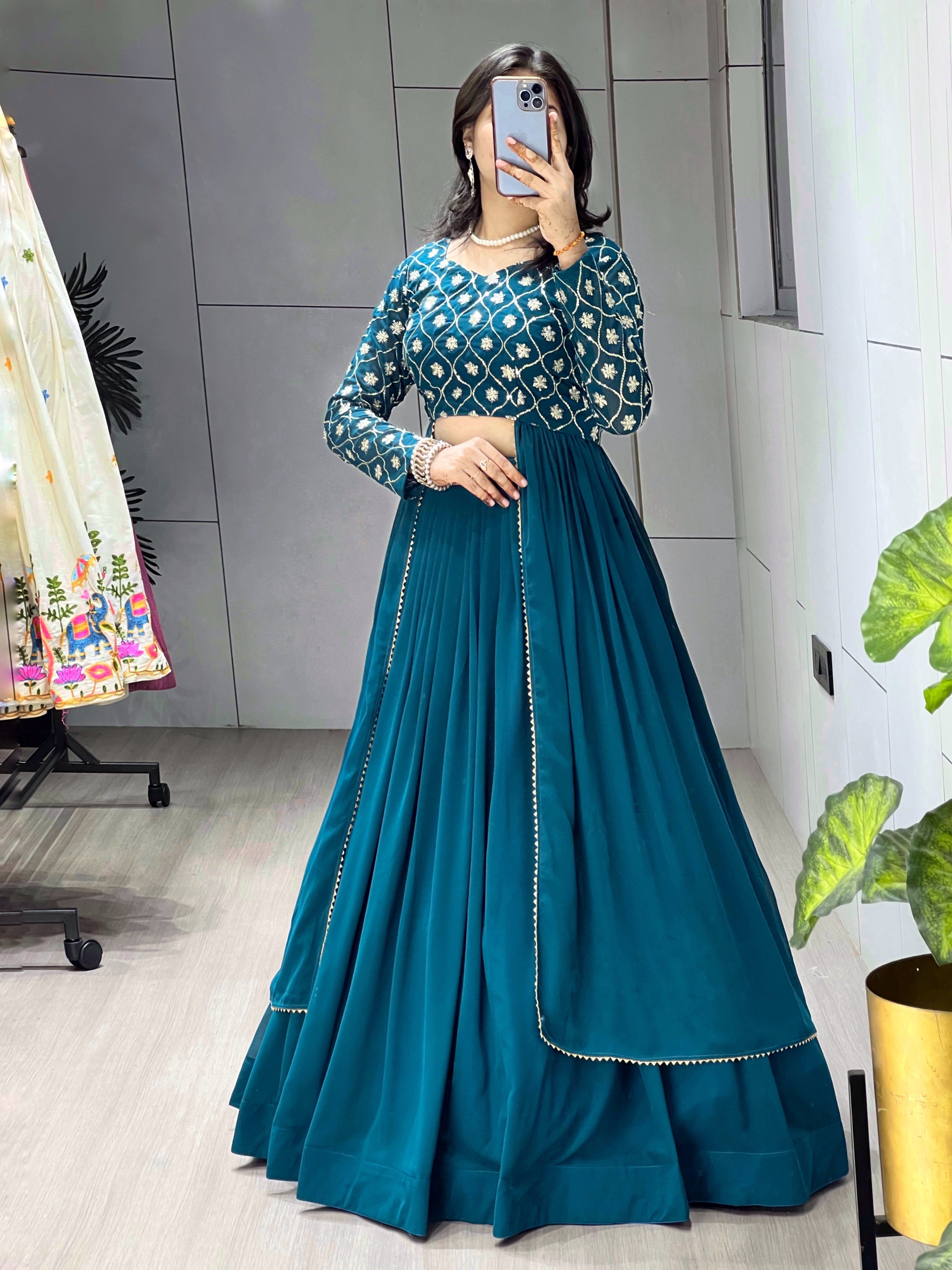 Trending Gorgette Lehenga With Traditional Embroidery Top
