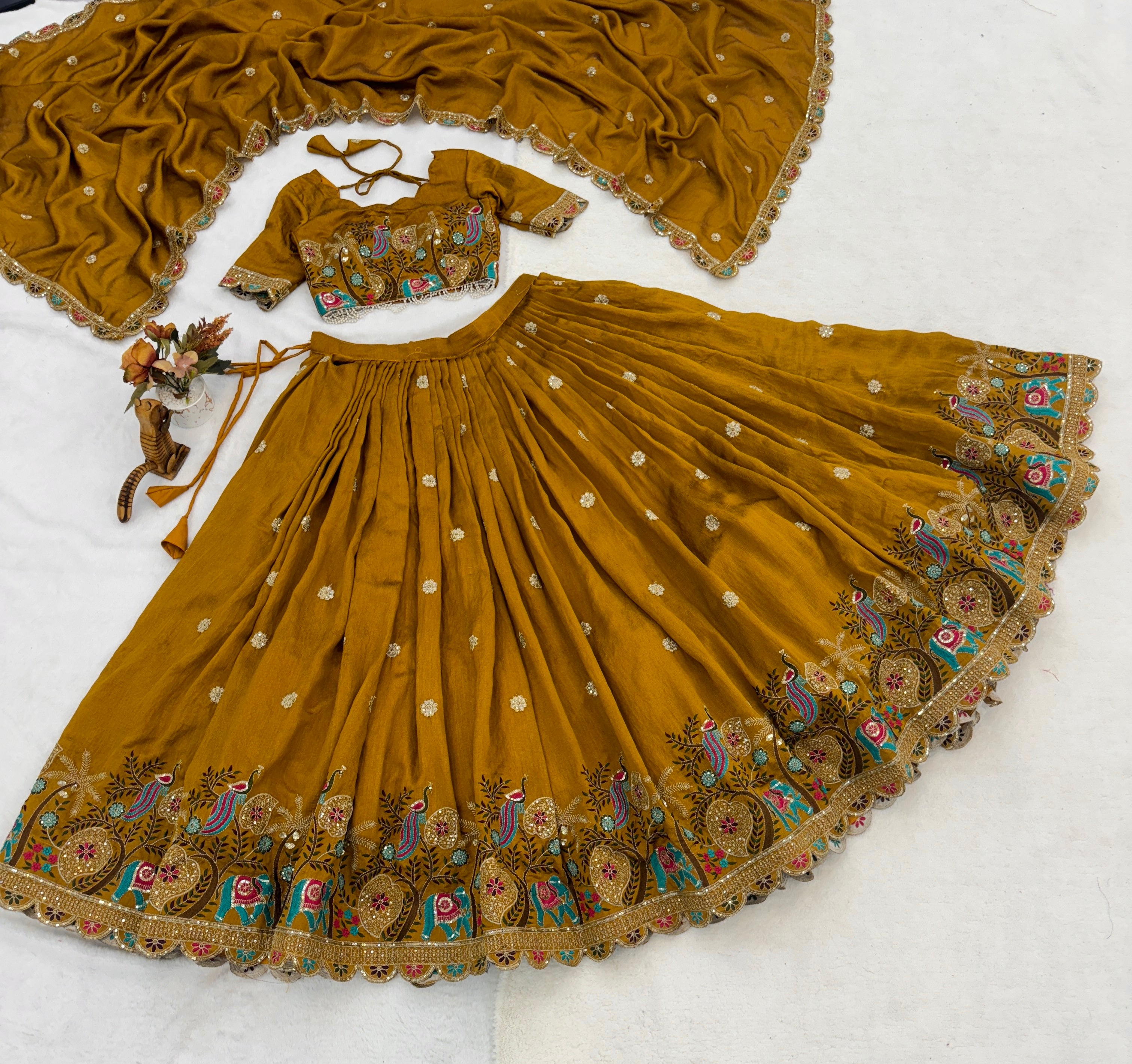 Designer Musturd Heavy Embroidery Lehenga With Fully Stitched Blouse