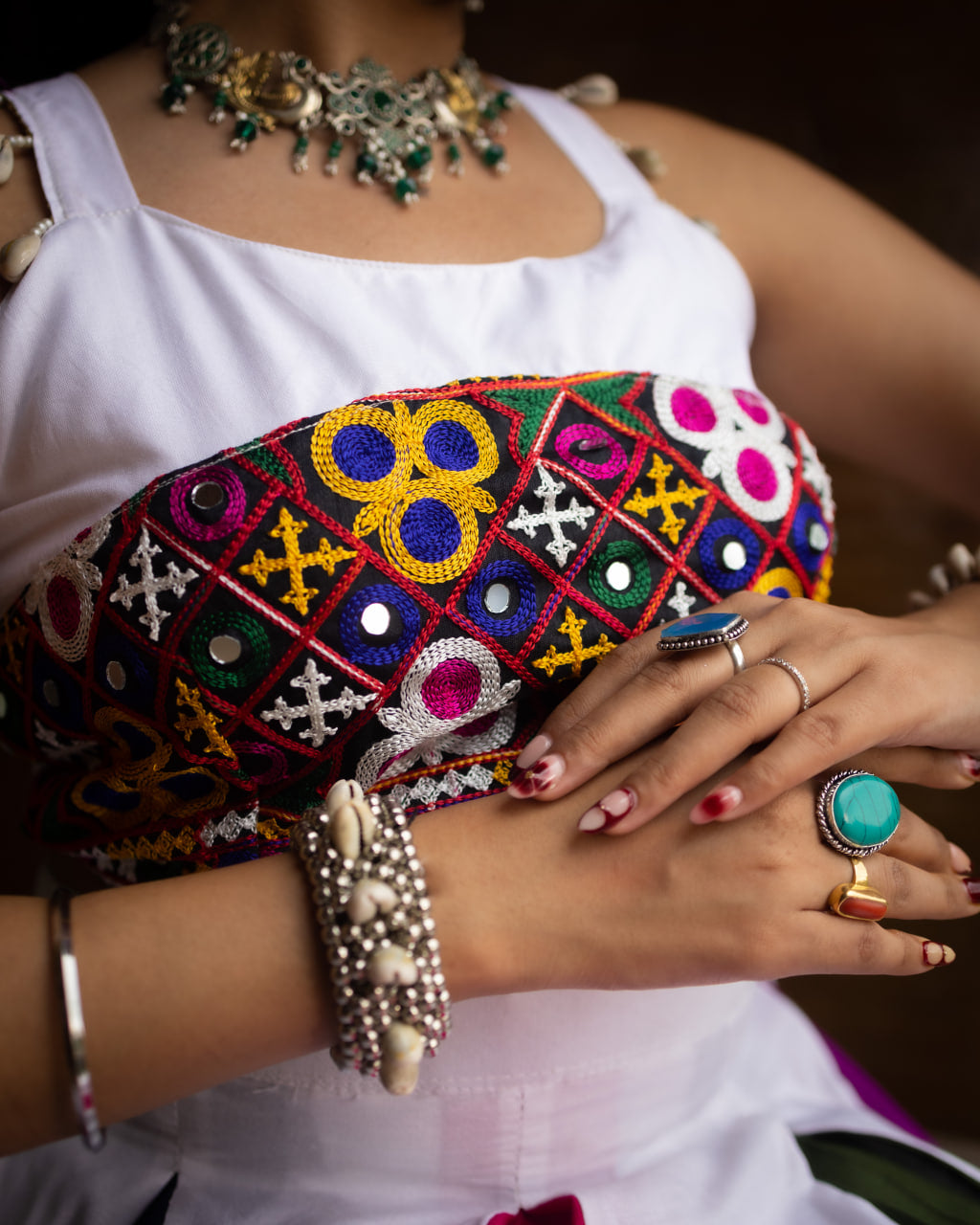 Heavily Embroidered Heart-Bodice Chaniya Choli with Multi-Color Paneled Skirt